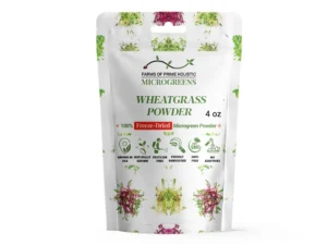 White pouch of wheatgrass powder labeled "Farms of Prime Holistic Microgreens," adorned with images of microgreens. Keywords: freeze-dried, GMO-free, 4 oz.